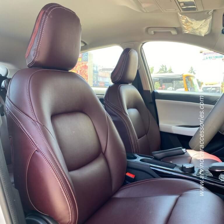 the interior of a car with leather seats